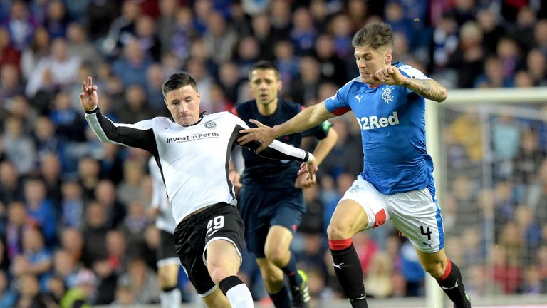 Michael O'Halloran (left) is chased down by Rangers Rob Kiernan