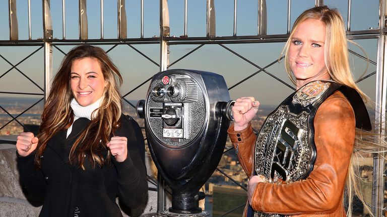 Miesha Tate and UFC Women's Bantamweight champion Holly Holm visit The Empire State Building at The Empire Sta