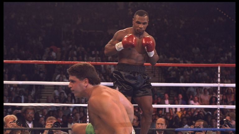 19 Aug 1995:  Boxer Mike Tyson sends Peter McNeeley crashing to the mat at the MGM Grand in Las Vegas, Nevada, in Tyson''s first bout since emerging from p
