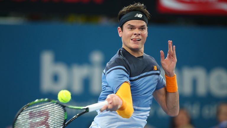 Raonic of Canada plays a forehand during his semi-final win over Tomic