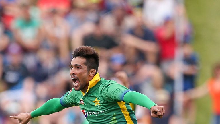 Mohammad Amir of Pakistan celebrates after taking the wicket of Corey Anderson of New Zealand during the first ODI