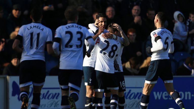 Nacer Chadli celebrates after scoring for Tottenham against Colchester