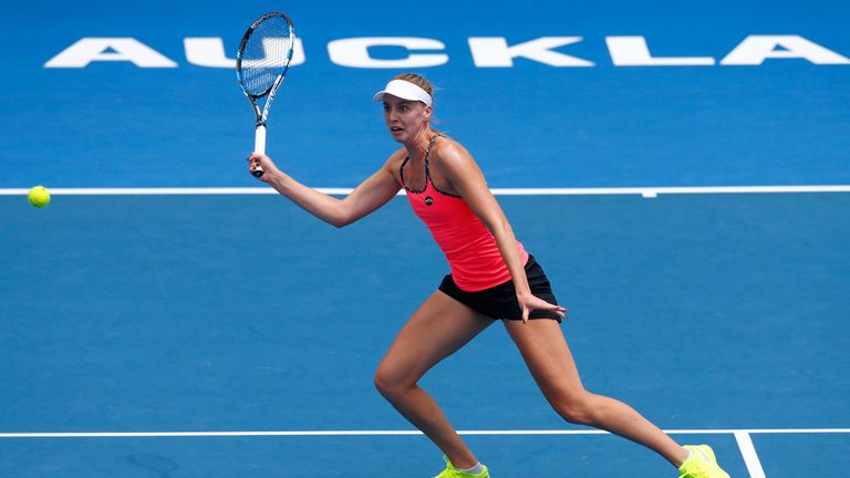 Naomi Broady plays a return in her singles match against Jelena Ostapenko in Auckland