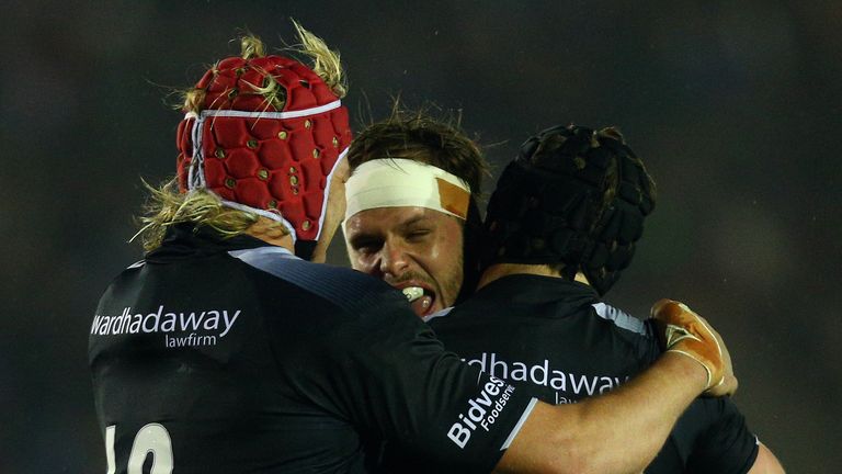 Newcastle Falcons celebrate at the final whistle as their side 