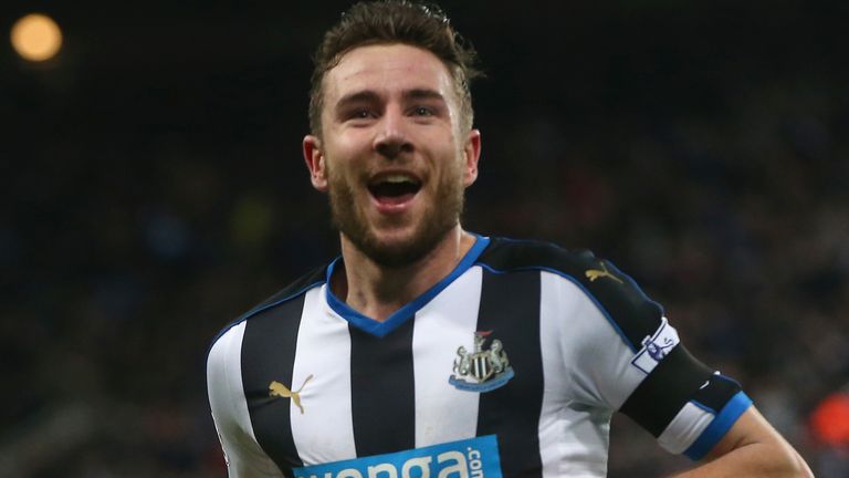 Paul Dummett of Newcastle United celebrates as he scores their third and equalising goal against Man United