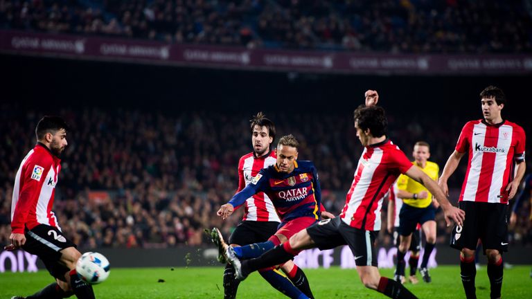 Neymar fires the ball past Iago Herrerin in the final minute