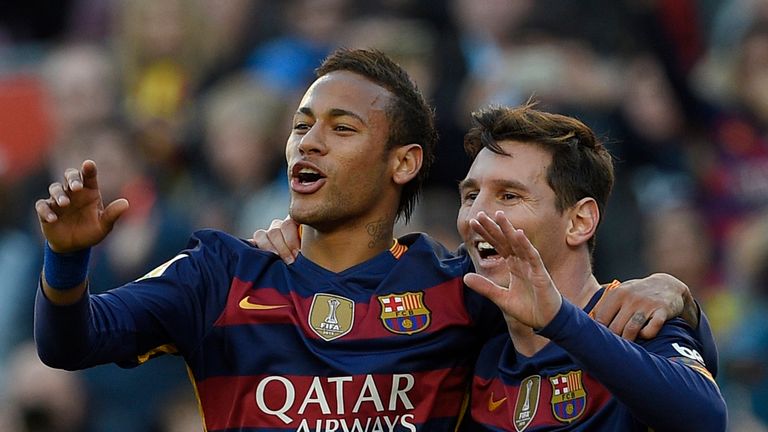 Barcelona's Argentinian forward Lionel Messi (R) celebrates a goal with Barcelona's Brazilian forward 
