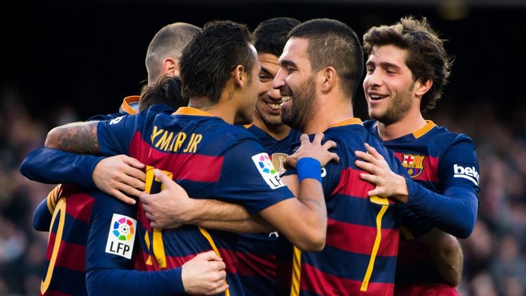 Neymar, Luis Suarez, Arda Turan and Sergi Roberto of FC Barcelona celebrate after Lionel Messi scored against Granada at the Nou Camp in January 2016