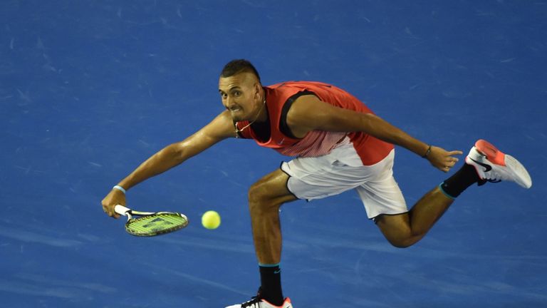 Nick Kyrgios hits a return against Tomas Berdych at the Australian Open