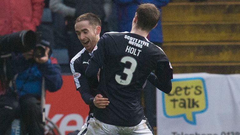 Dundee's Nick Ross celebrates with Kevin Holt as his shot is deflected into the back of the net from Dundee United's Sean Dillon 