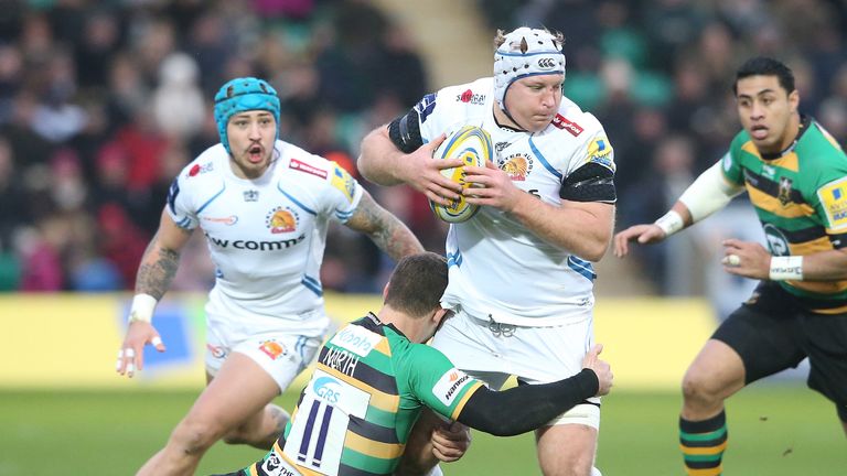 NORTHAMPTON, ENGLAND - JANUARY 01:  Thomas Waldrom of Exeter is tackled by George North during the Aviva Premiership match between Northampton Saints and E