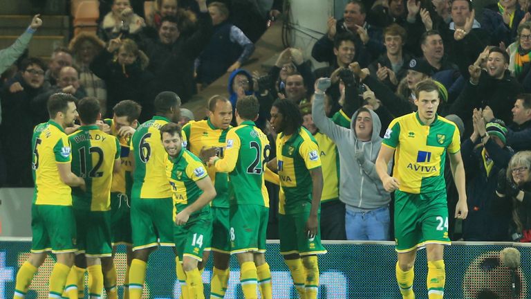 Norwich celebrate Tettey's winning goal