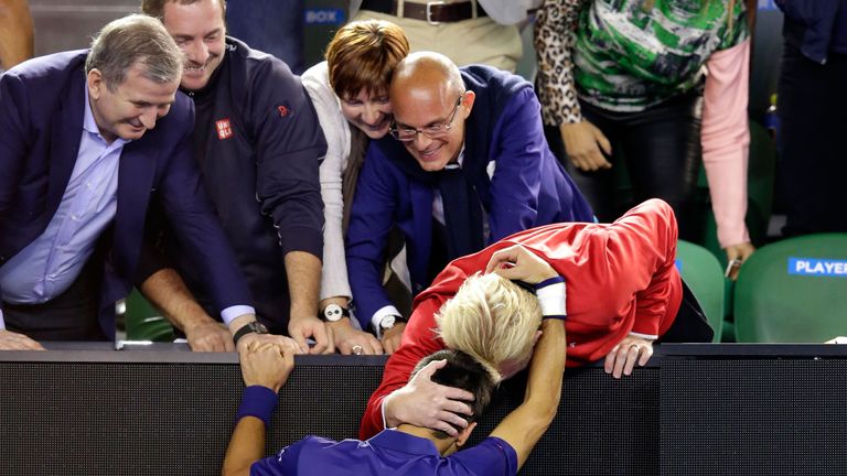Novak Djokovic hugs his coach Boris Becker