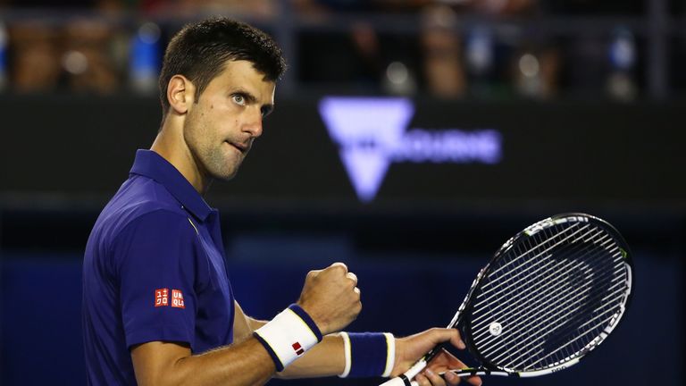 Novak Djokovic celebrates a point in his semi final match against Roger Federer