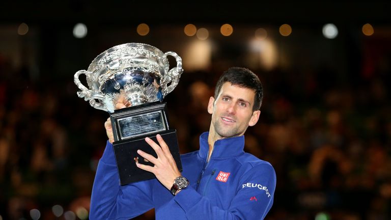 Novak Djokovic lifts the Australian Open trophy after beating Andy Murray in the 2016 final at Melbourne Park