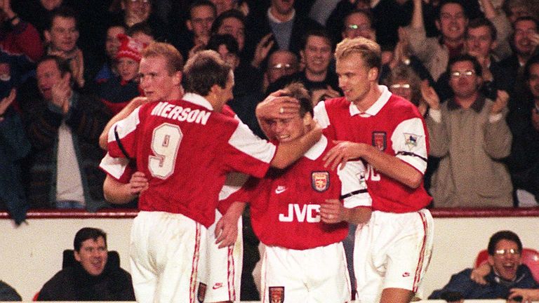 Paul Dickov (2nd right) is congratulated by teammates (from left) John Hartson, Paul Merson and Dennis Bergkamp after putting Arsenal ahead 3-2 in tonight'