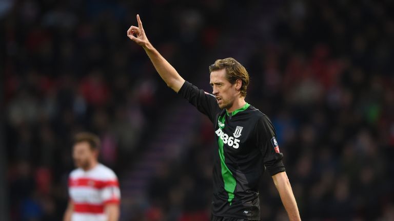 Peter Crouch of Stoke City celebrates scoring his team's first goal against Doncaster