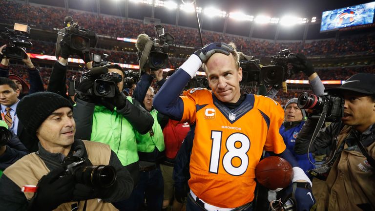 Peyton Manning #18 of the Denver Broncos stands at midfield after a game against the San Diego Chargers at Sports Authority Field at Mile High