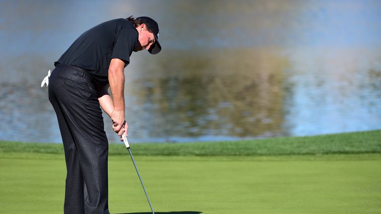 Phil Mickelson putts on the ninth green during the final round of the CareerBuilder Challenge 