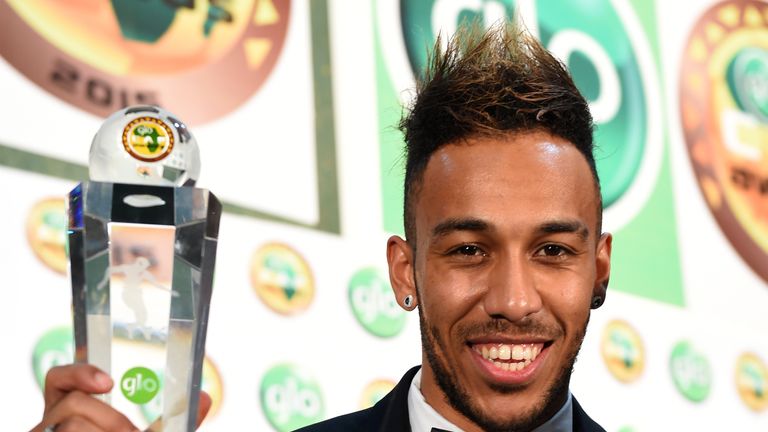 Pierre-Emerick Aubameyang poses with the African Footballer of the Year Award