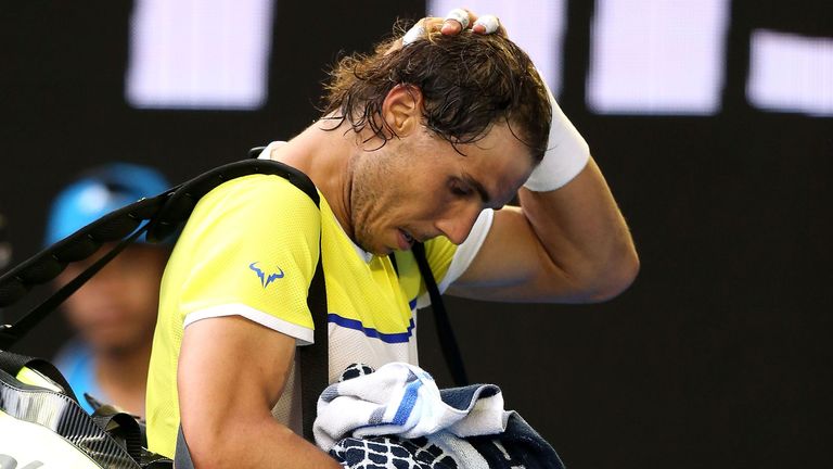 Rafael Nadal walks off court after losing his first round match against Fernando Verdasco at the 2016 Australian Open 