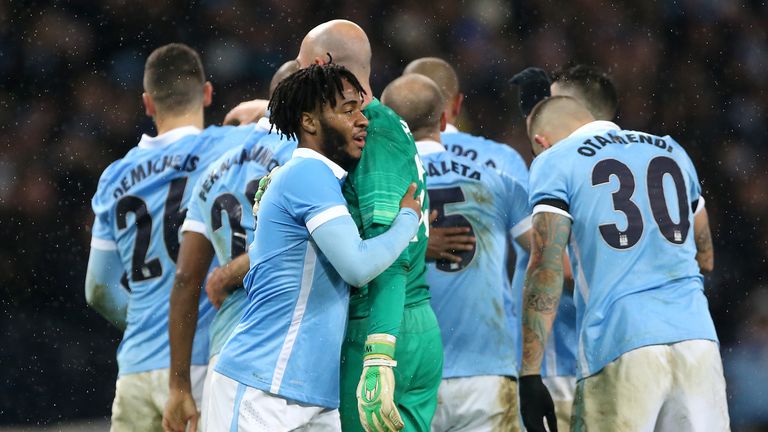 Manchester City's Raheem Sterling celebrates with his team-mates after the Capital One Cup, semi final, second leg at the Etihad Stadium, Manchester.