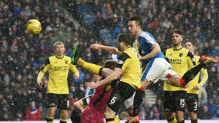 Rangers' Danny Wilson heads home his side's first goal 