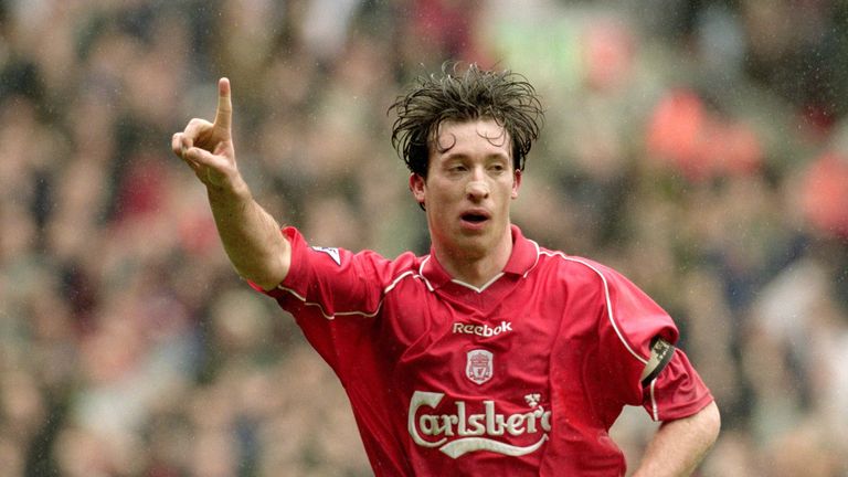 Robbie Fowler celebrates scoring Liverpool's second goal against Manchester United in March 2001