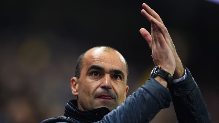 Roberto Martinez the manager of Everton applauds the fans  looks on during the Capital One Cup Semi Final