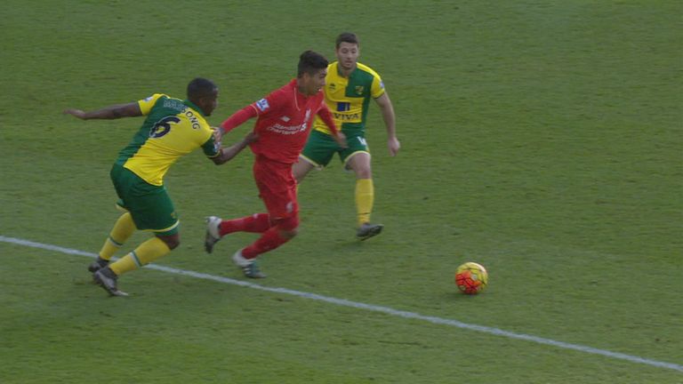 Sebastien Bassong pulls Roberto Firmino outside the box in this photo, but initial contact started inside the box