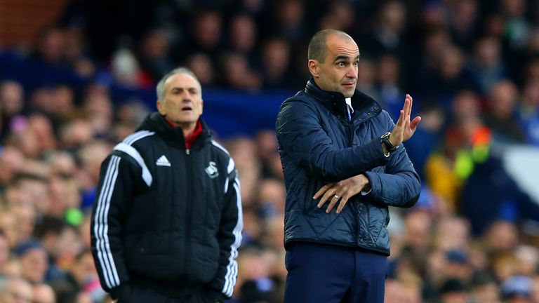 Roberto Martinez (right) wants more from Everton in the early stages of games at Goodison Park