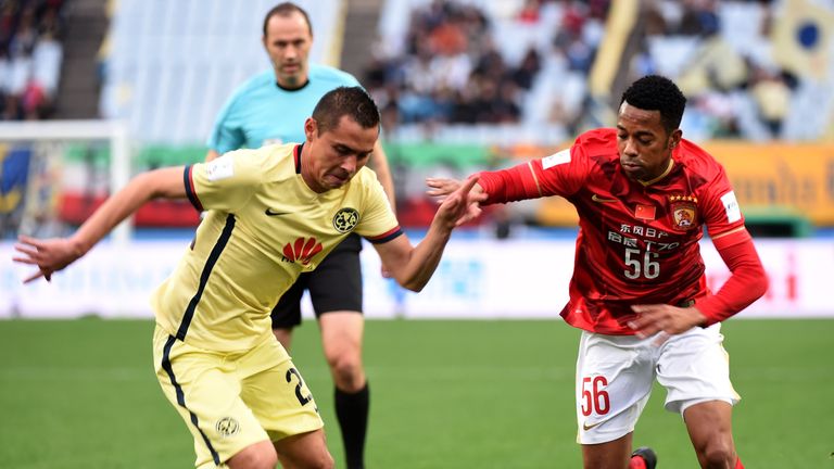 Robinho (R) now plays for Guangzhou Evergrande