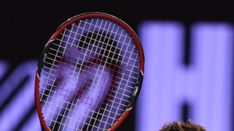 Switzerland's Roger Federer celebrates after victory in his men's singles match against Bulgaria's Grigor Dimitrov