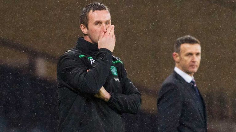 Ronny Deila Celtic manager in the rain at Hampden v Ross County