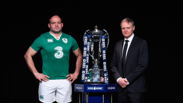 Rory Best, captain of Ireland (left) and head coach Joe Schmidt pose with the Six Nations trophy