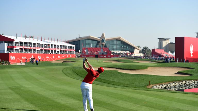 ABU DHABI, UNITED ARAB EMIRATES - JANUARY 21:  Rory McIlroy of Northern Ireland plays his second shot on the par five 18th hole during the first round of t