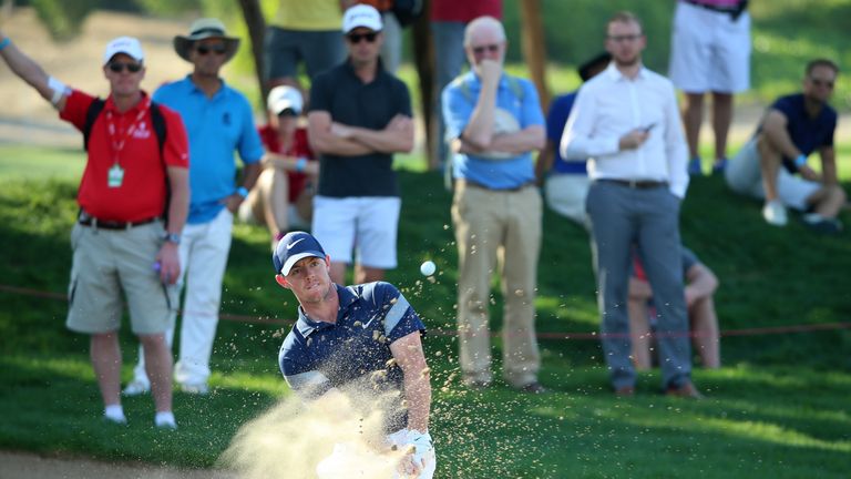 Rory McIlroy of Northern Ireland plays from a bunker on the 15th hole during round four of the Abu Dhabi HSBC Golf Championship 