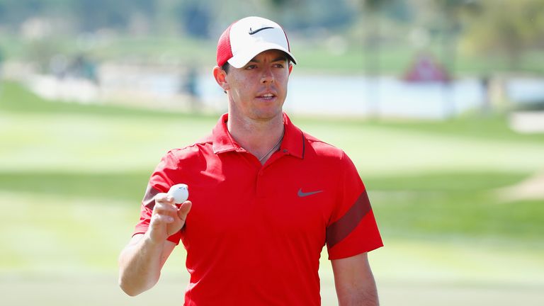 Rory McIlroy waves to the gallery on the ninth green during the first round of the Abu Dhabi Golf Championship on January 21, 2016