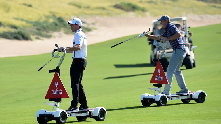 McIlroy and Spieth enjoyed riding a golfboard during practice in Abu Dhabi