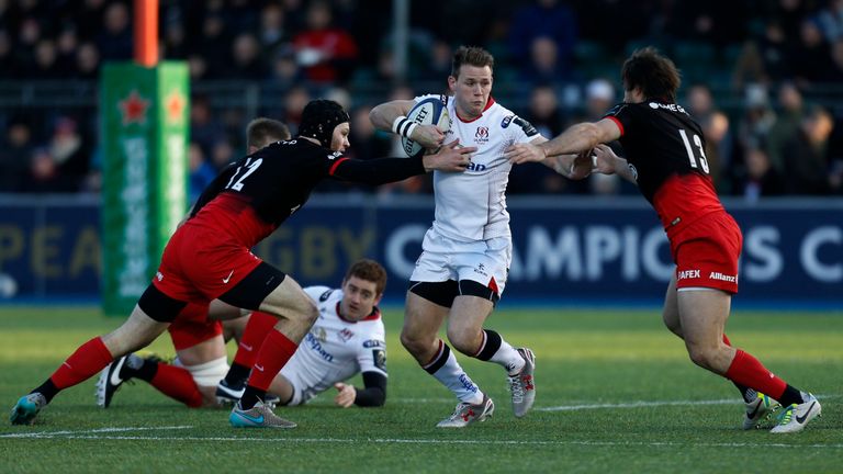 Ulsters' Craig Gilroy is challenged by Saracens' Duncan Taylor and Marcelo Bosch