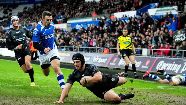 Dan Evans scores the Ospreys' first try against the Dragons
