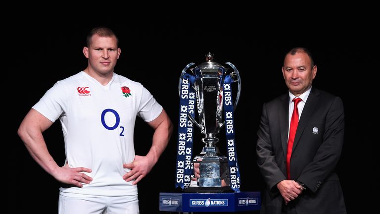 England captain Dylan Hartley and head coach Eddie Jones pose with the Six Nations trophy