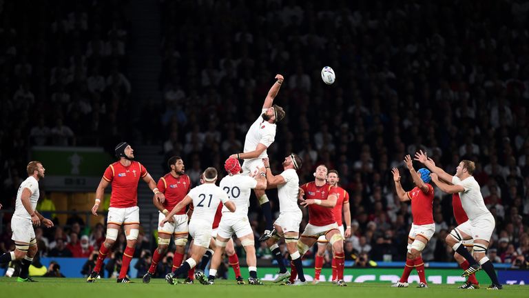 England's Geoff Parling (centre) fails to catch the ball in a lineout during their Rugby World Cup loss to Wales