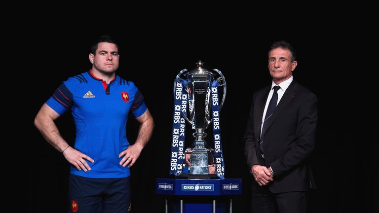 France captain Guilhem Guirado and head coach Guy Noves pose with the Six Nations trophy