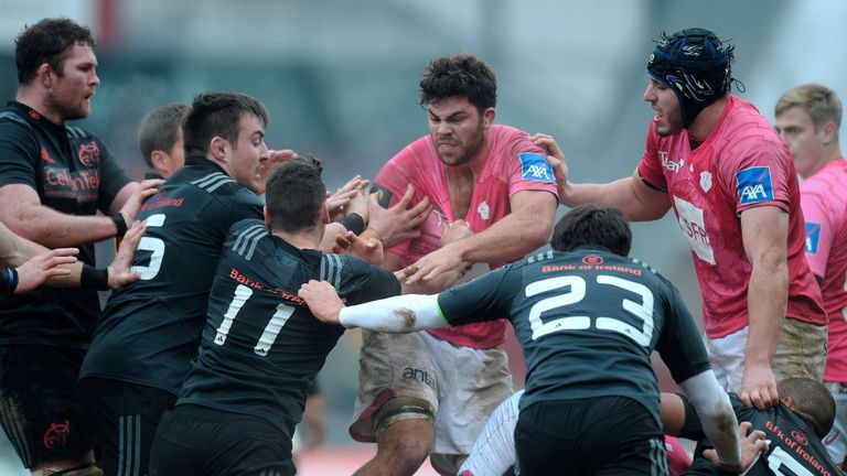 Stade Francais flanker Jonathan Ross is closed down by the Munster defence