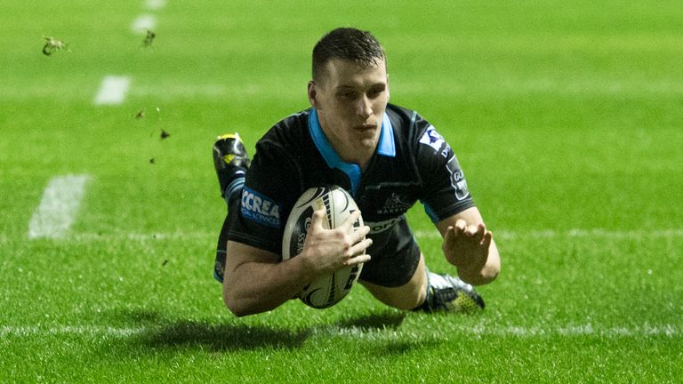 Glasgow Warriors' Mark Bennett scores a try against Edinburgh