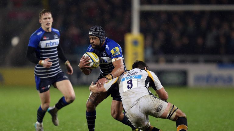 Sam Tuitupou of Sale Sharks is tackled by Sam Jones of Wasps