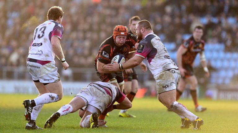 Exeter Chiefs No 8 Thomas Waldrom is halted against Ospreys