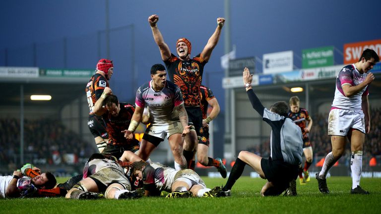 Exeter Chiefs players celebrate after Thomas Waldrom's late try against the Ospreys