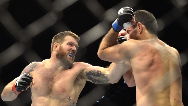 Ryan Bader of the USA punches Anthony Perosh of Australia during their UFC Fight Night Brisbane bout at the Brisbane En